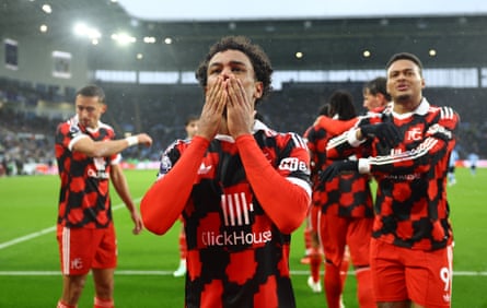 Oscar Bobb celebrates
