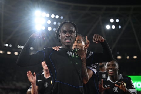 Chelsea's Trevoh Chalobah celebrates scoring their fifth goal with Joao Pedro.