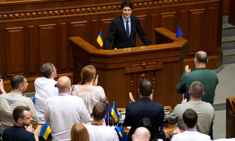 Canada’s prime minister, Justin Trudeau, receives a standing ovation as he appears at the Ukrainian parliament in Kyiv, Ukraine, on Saturday.