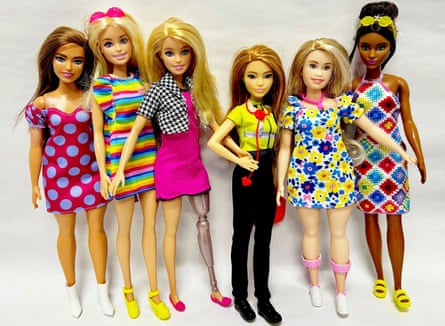A line-up of current Barbies. The two dolls on the left are in heels, the rest are in flats.