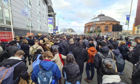 People queue as they arrive for the Cop26 summit in Glasgow