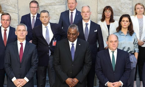 Nato ministers of defence and Nato secretary General Jens Stoltenberg (L), US secretary of defence Lloyd Austin (C) and British defence secretary Ben Wallace (R) for an official photograph at the Nato headquarters in Brussels.