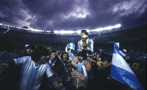 Argentina captain Daniel Passarella holds on to the trophy after the 1978 final.