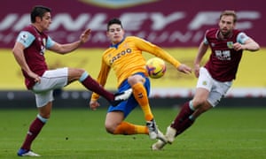 Everton’s James Rodriguez is challenged by Ashley Westwood.