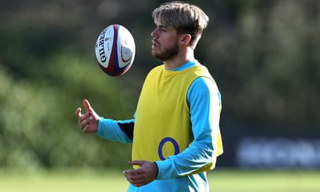 Ollie Hassell-Collins catches the ball during the England training session