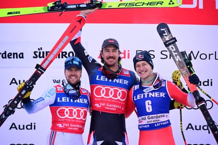 Bryce Bennett poses with Norway’s Aleksander Aamodt Kilde and Switzerland’s Marco Odermatt on the podium after Thursday’s race.