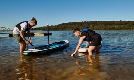 Nic Cooper and Cait Kelly preparing to SUP at Lysterfield Park, Melbourne, Australia