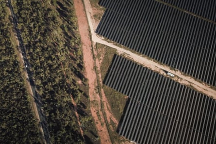 Aerial view of solar panels in a large solar farm