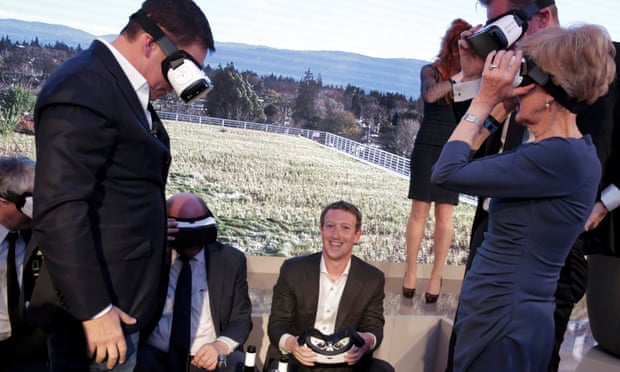 Facebook CEO Mark Zuckerberg and others use virtual reality headsets during an awards ceremony in Berlin, February 25, 2016.
