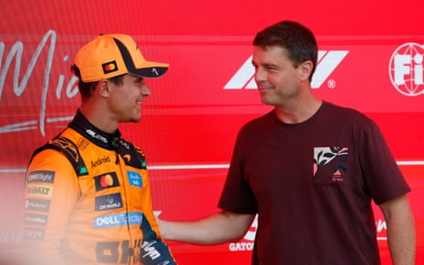 McLaren’s Lando Norris celebrates winning the sprint race with NASA’s Artemis II captain Reid Wiseman.