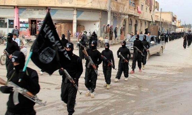 Islamic State fighters march through Raqqa, Syria, in 2014. Shehroze Chaudhry admitted that his account of travelling to Syria was fictitious.