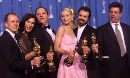 David Parfitt, Donna Gigliotti, Harvey Weinstein, Gwyneth Paltrow, Edward Zwick and Marc Norman celebrate after receiving the Oscar for best picture for Shakespeare In Love during the 71st annual Academy Awards in Los Angeles on 21 March 1999.
