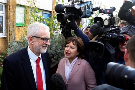 Jeremy Corbyn talks to members of the media outside his home on Friday.