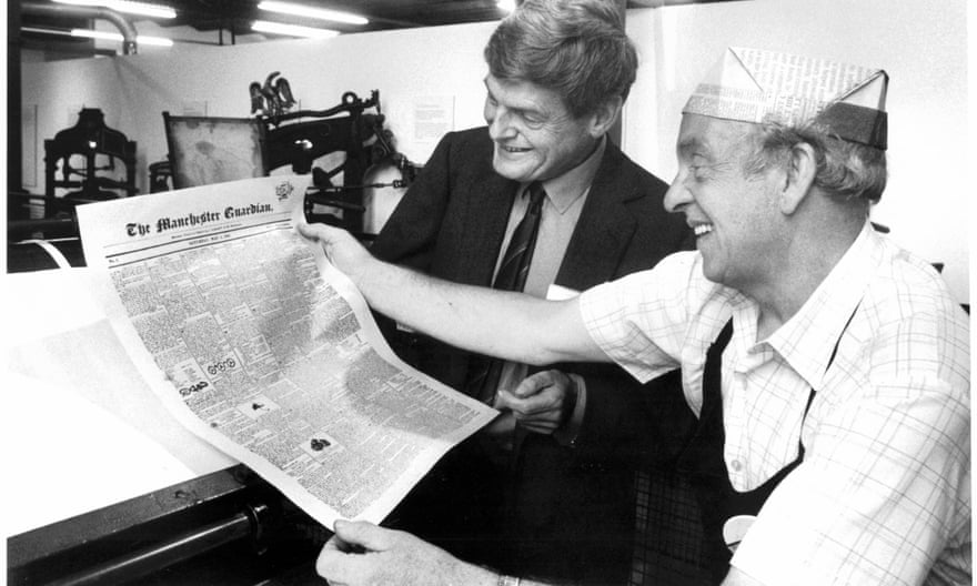Peter Preston with a newly printed copy of the first Guardian front page.
