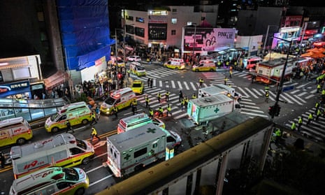 Ambulances in Seoul’s nightlife district of Itaewon after a crowd crush in an alley left at least 150 dead and 150 more injured