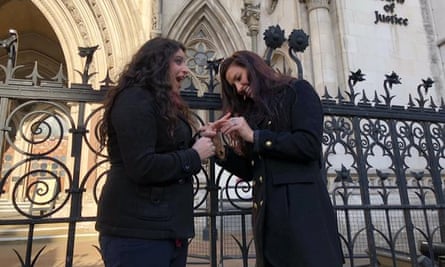 Chrissy Chambers (right) proposed to her partner, Bria Kam, outside the court on Wednesday.