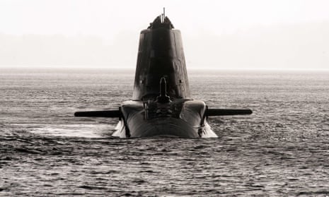 Surfaced submarine seen from head on