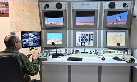 A soldier uses a tank driving simulator at the Spanish army's training centre of San Gregorio in Zaragoza.