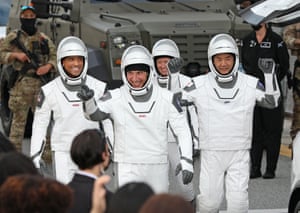 NASA astronauts Mike Hopkins, Victor Glover, and Shannon Walker, and Japan Aerospace Exploration Agency astronaut Soichi Noguchi.