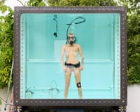 A performer submerged in filtered urine in Florentina Holzinger’s Austrian Pavilion.