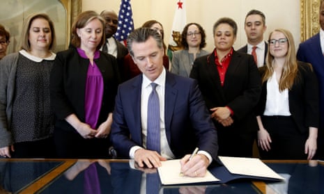 Gavin Newsom signs the executive order placing a moratorium on the death penalty in California.