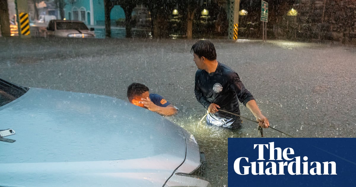 At least two killed after heavy rain in New York region floods subways and strands vehicles