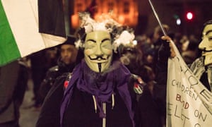 Protesters wore Guy Fawkes masks in reference to the film V for Vendetta.