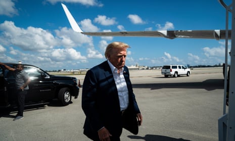 Donald Trump boards his airplane on 22 February 2023, in West Palm Beach, Florida. 
