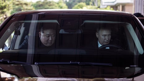 Putin takes Kim Jong-un for a drive in Russian luxury car – video