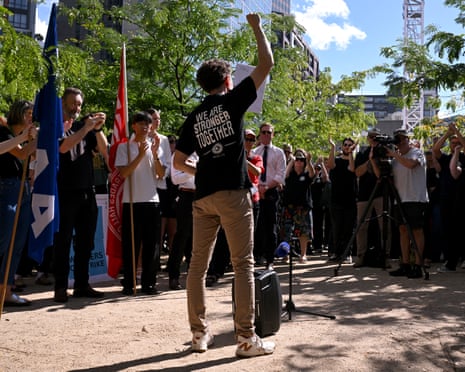 ABC staff walk out of the Melbourne office on strike, demanding better pay and protections to stop AT taking their jobs.