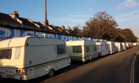 Vans and caravans lines up on New Gatton Road.