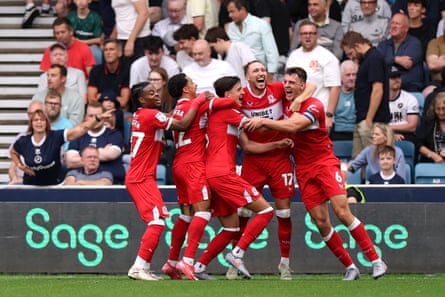 Alfie Jones celebrates scoring Middlesbrough’s second goal against Millwall with his teammates.