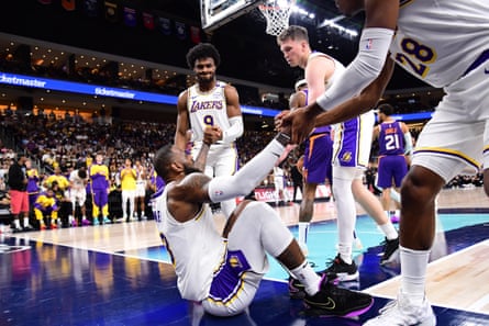 It means everything': LeBron James takes court alongside son Bronny for first time | LeBron James | The Guardian