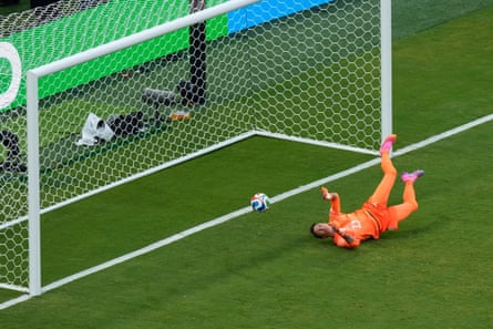 Fernando Muslera watches the ball squirm from his grasp for Spain’s goal