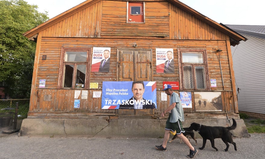 Posters of the two candidates on a house in the north-eastern town of Tykocin