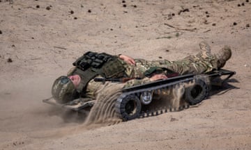 Demonstration of a remote-controlled evacuation stretcher vehicle during a presentation by Ukrainian defence manufacturers in the Kyiv area on Tuesday