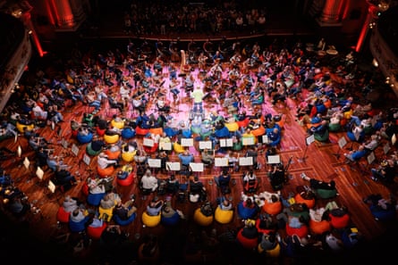 view from above of a concert with audience sitting on beanbags
