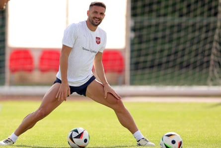 Serbia’s Dusan Tadic stretches during a training session as part of the team’s preparation for the upcoming Euro 2024 tournament.