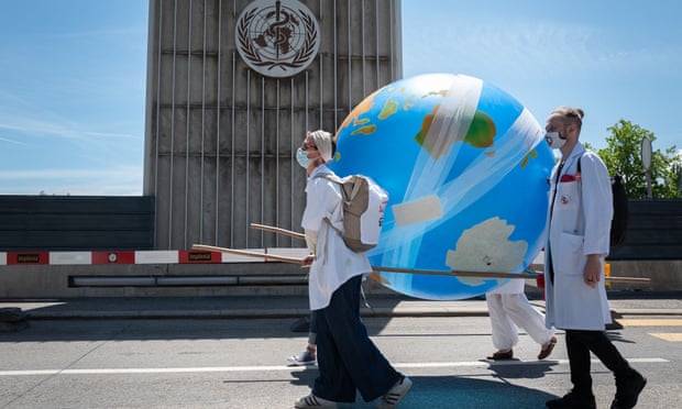 Doctors for Extinction Rebellion demonstrate in front of the World Health Organization in Geneva earlier this year.