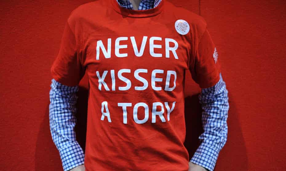 A Labour supporter wears a Never Kissed A Tory T-shirt