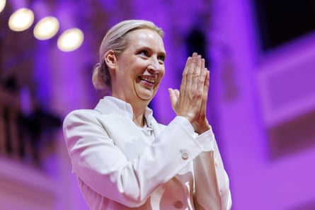 Alice Weidel from Alternative für Deutschland (AfD) clapping her hands and smiling