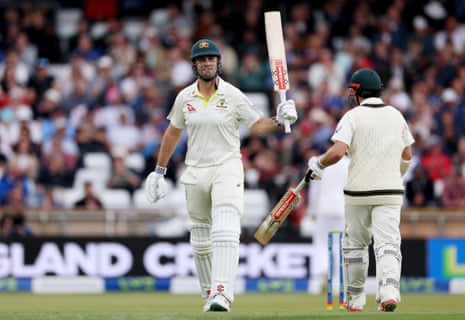Mitchell Marsh salutes the crowd after reaching his half century.