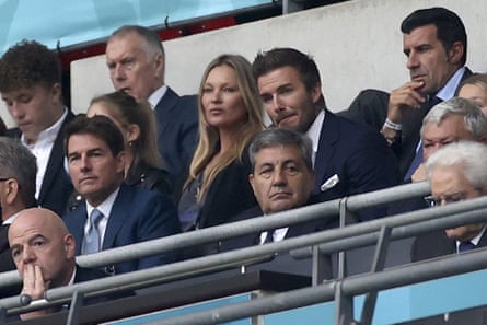 Luís Figo (top right) glares at Gianni Infantino (bottom left) during the Euro 2020 final at Wembley.