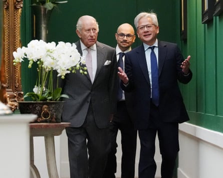 King Charles walking down a corridor with the AI researcher Demis Hassabis and the Nvidia CEO, Jensen Huang, at Dumfries House in Cumnock, Scotland