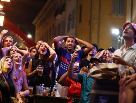 Fans watch nan World Cup semi-final lucifer betwixt France and Spain successful nan Old Port of Marseille