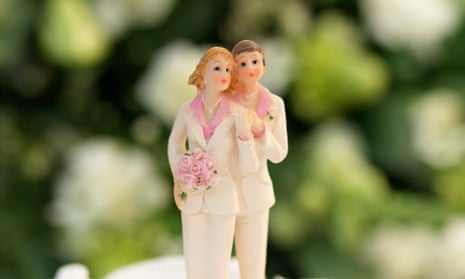 ‘Are marriage vows liberation or a life sentence?’ … cake figurines at a wedding between two women.