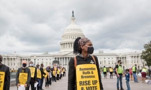 A group of clergy, rabbis and imams march from the US Capitol to the Dirksen Senate Office Building during a demonstration to remember Supreme Court Justice Ruth Bader Ginsburg, earlier today. The group was led by Reverend Dr William Barber.