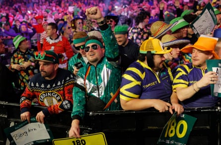 Spectators in fancy dress during the semi-finals of the PDC World Darts Championship.