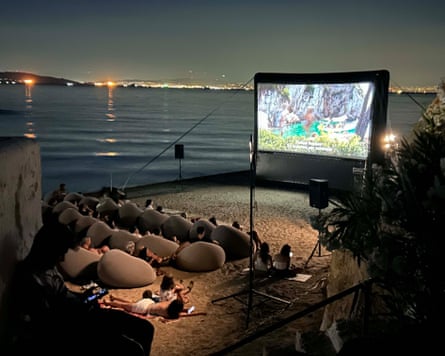 A summer tradition … an open-air cinema with beanbags on the beach.