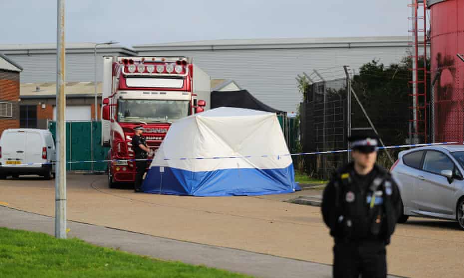 Image of lorry and tent and police officer in Grays, Essex